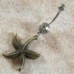 Bronze Starfish Belly Ring On White Rhinestone..